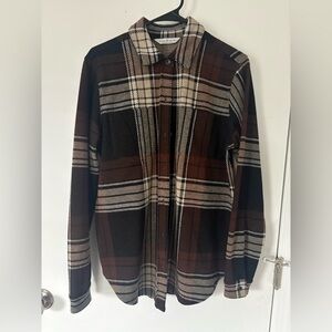 Women’s button up shirt.